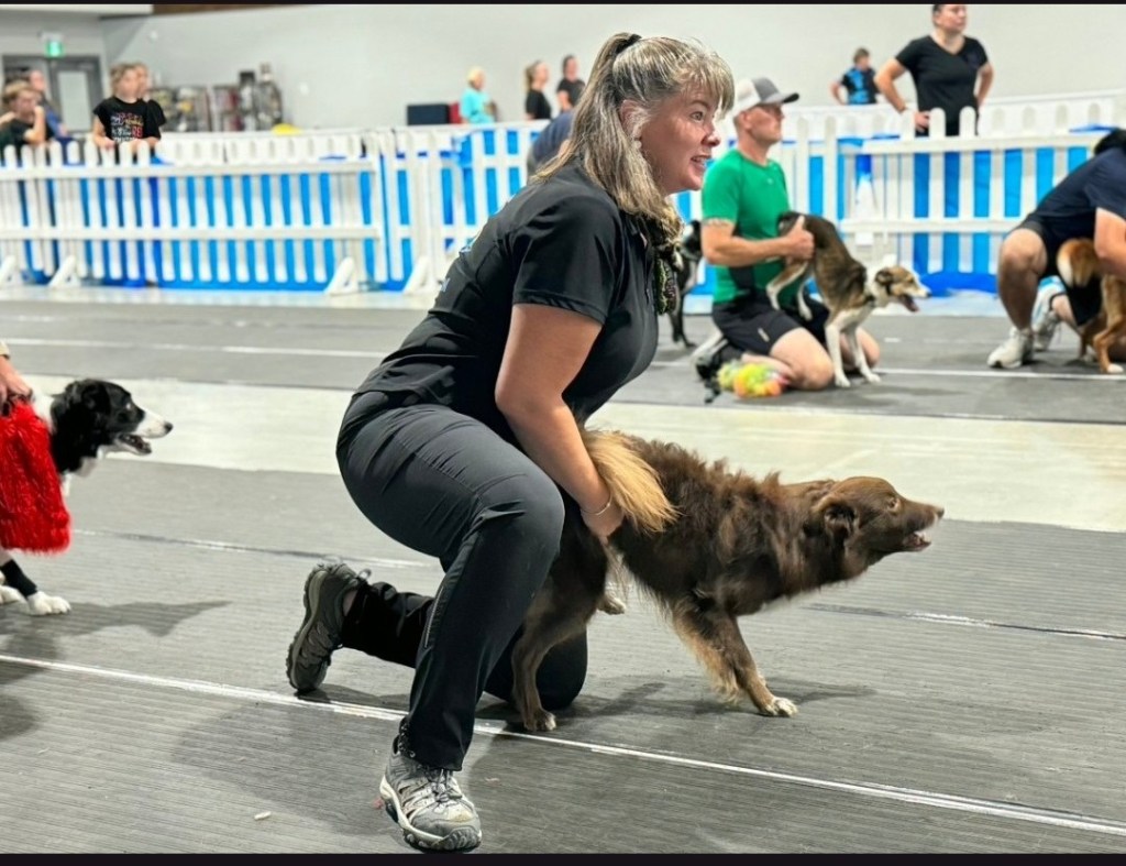 (Pictured:  team coach and trainer 
Alicia)